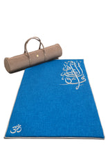Load image into Gallery viewer, Sustainable hand tailored empowering and supporting small businesses and artisans for social impact and economic support. Local artisans are invovled every step of the way with this linen cotton fabric and silver embroidered with arabic calligraphy trimming inspired by healing mantras and chants of bija and chakra notes. Meditation, prayer and serenity mats or rugs. padded with local sourcing and suppliers. Sounds of Healing serenity mat by A'myn, with its hand tailored bag