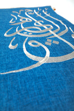 Load image into Gallery viewer, Sustainable hand tailored empowering and supporting small businesses and artisans for social impact and economic support. Local artisans are invovled every step of the way with this linen cotton fabric and silver embroidered with arabic calligraphy trimming inspired by healing mantras and chants of bija and chakra notes. Meditation, prayer and serenity mats or rugs. padded with local sourcing and suppliers. Sounds of Healing serenity mat by A'myn,
